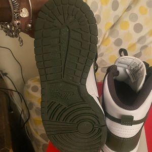 Green and white Nike dunks
